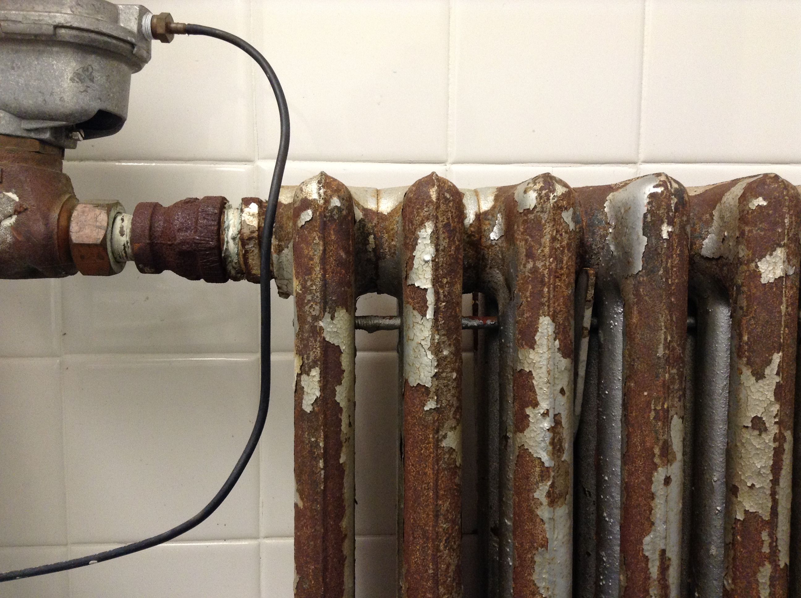 Closeup of a rusting metal radiator