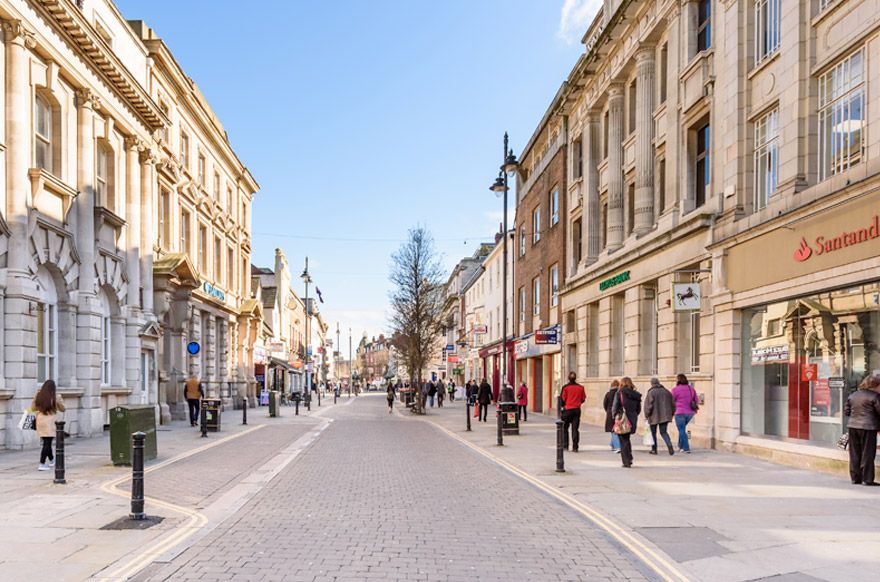 a long street with building in two sides