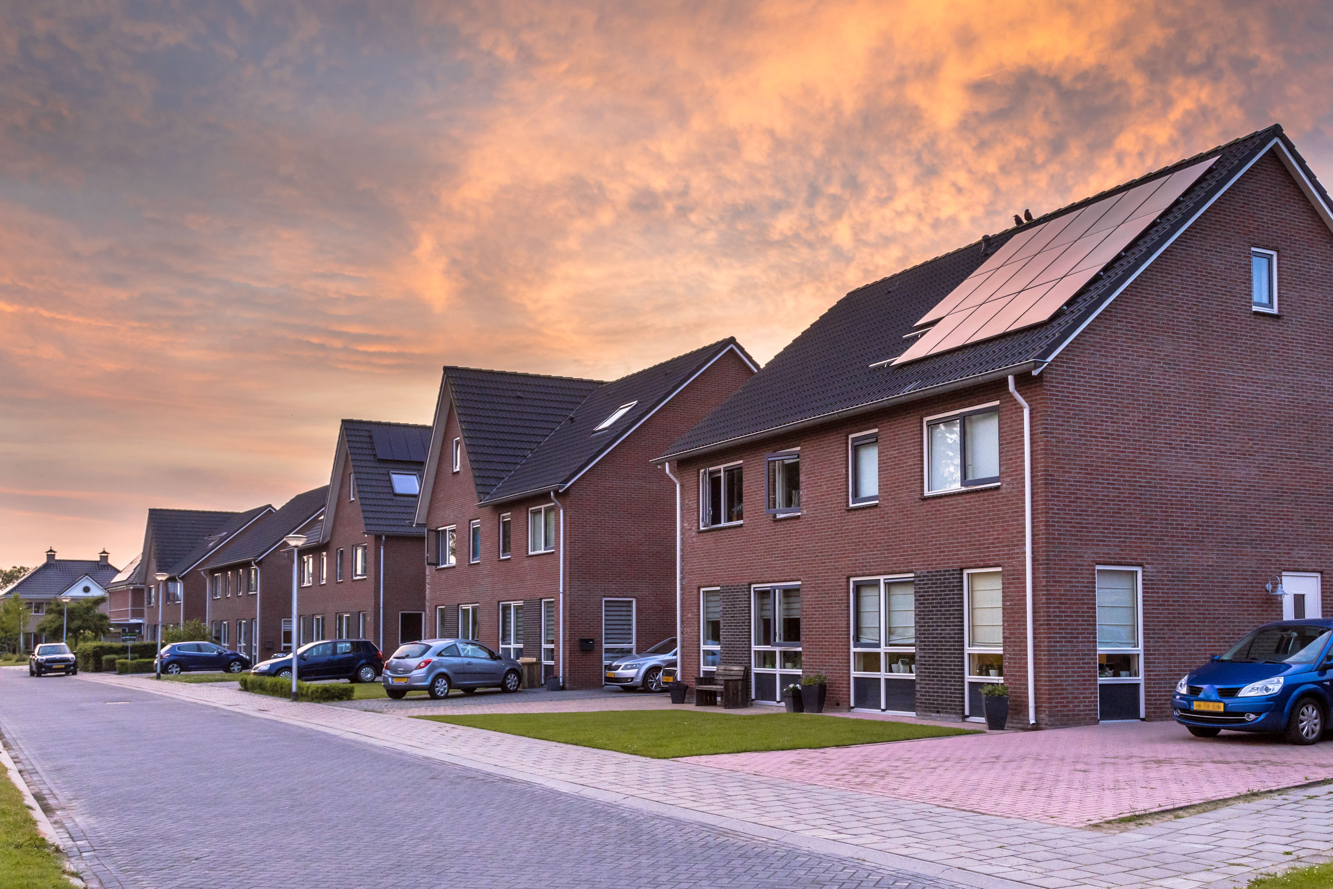 Street with modern family houses in a suburb