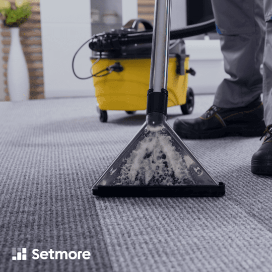 Grey carpet being cleaned