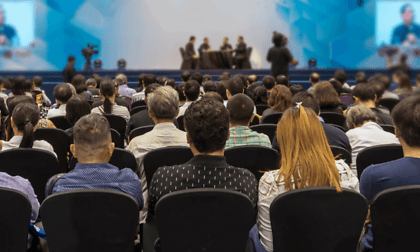 Audience watching a conference