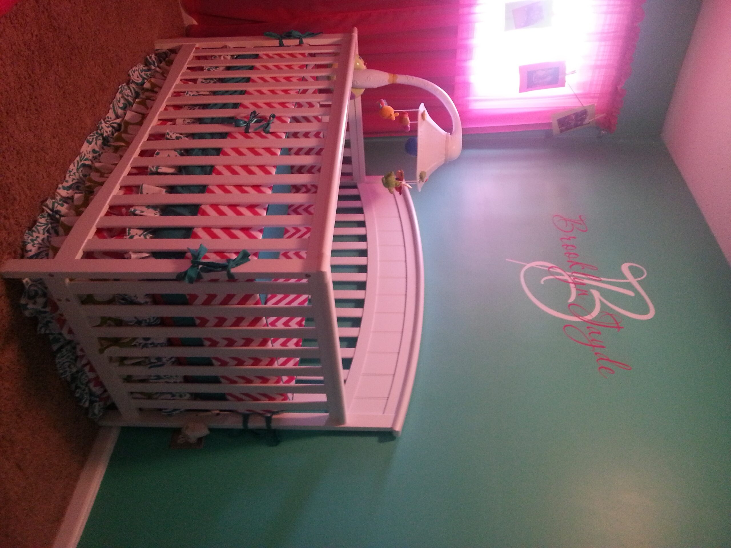Pink and Blue Girl Nursery Crib View