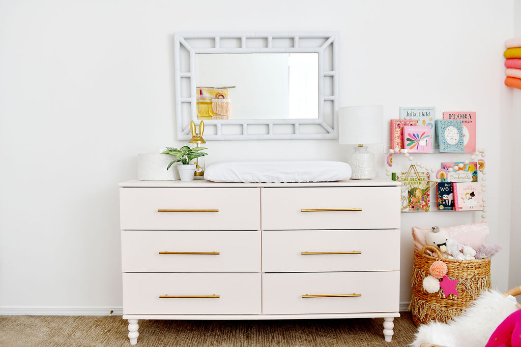 Pink IKEA Hack Dresser with Acrylic Wall Bookshelves