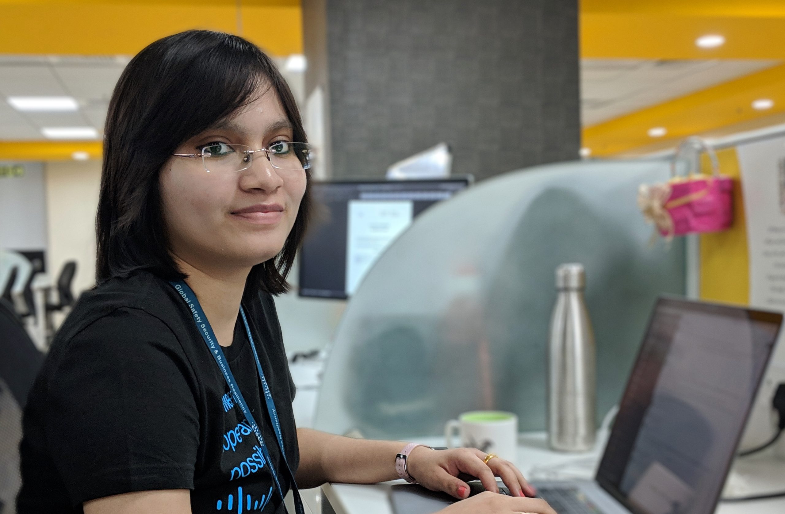 Trisha sitting at desk