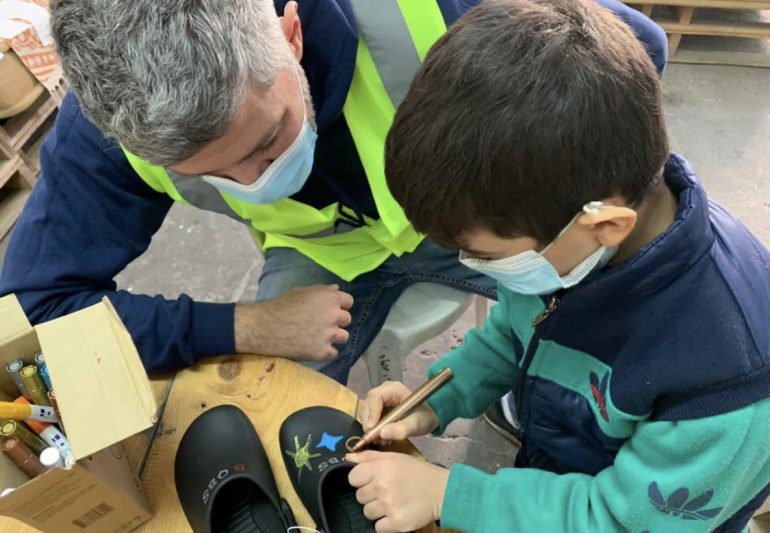 Cisco employee with a young child