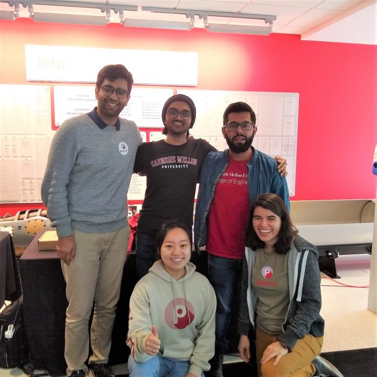A group of students smiling for the camera