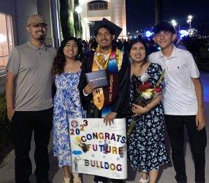 Evelyn with her family at brother's graduation ceremony