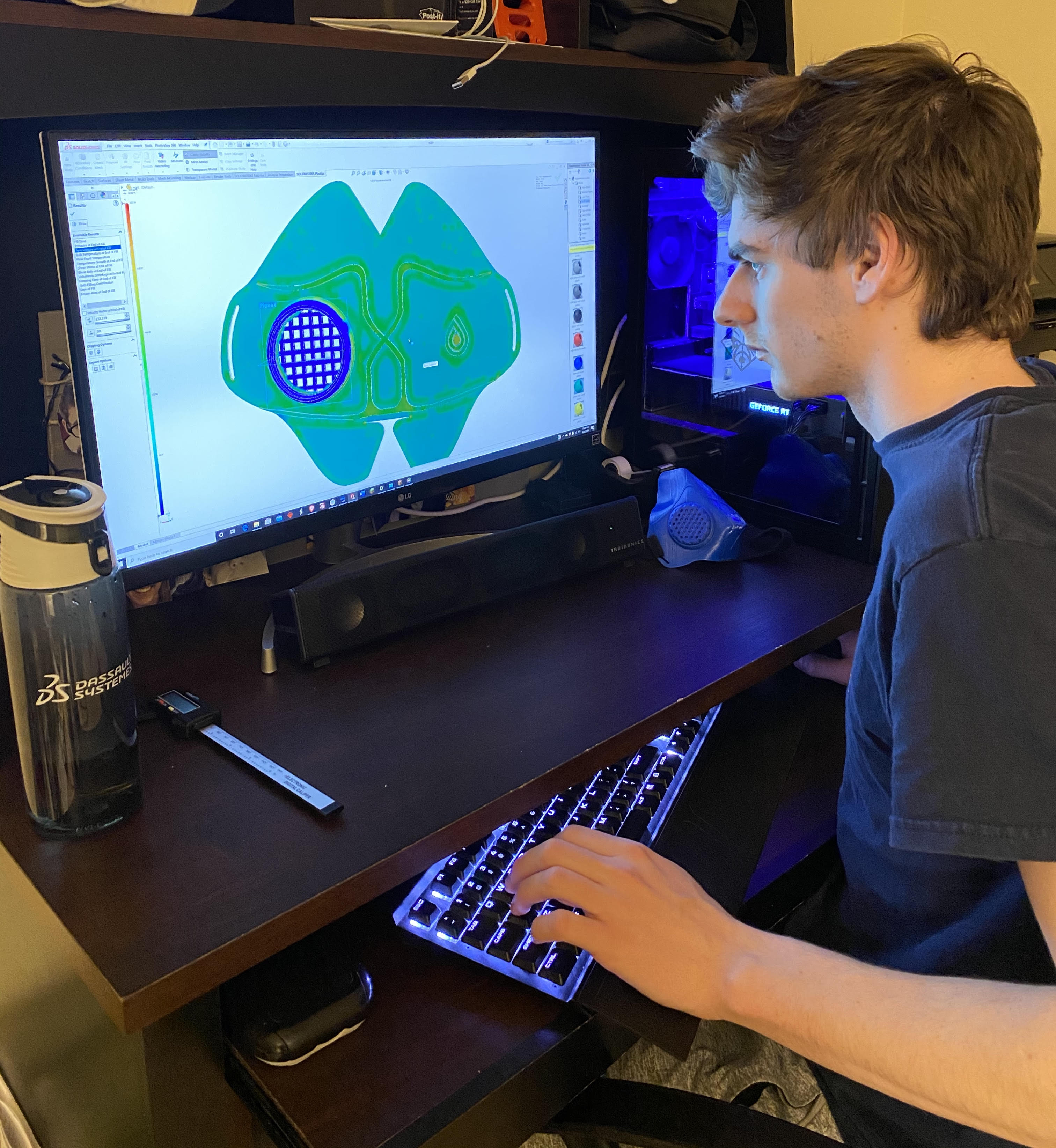 Jordan Florian working on the design of the OmniMask