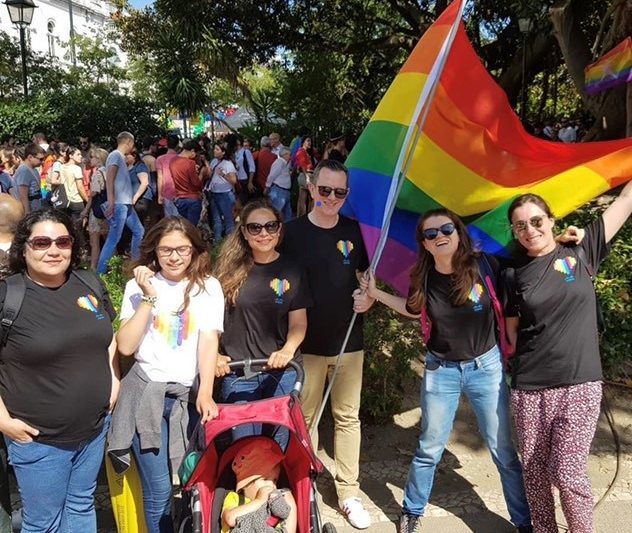 Mariya holds the Pride flag at the Portugal PRIDE parade with fellow members of the Cisco Pride Employee Resource Organization.