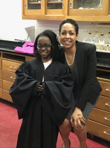 Judge Sabree with a young girl
