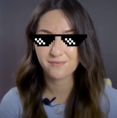 Sofya with pixelized glasses on. 