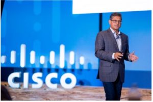 photo of Denzil Samuels speaking at a cisco event