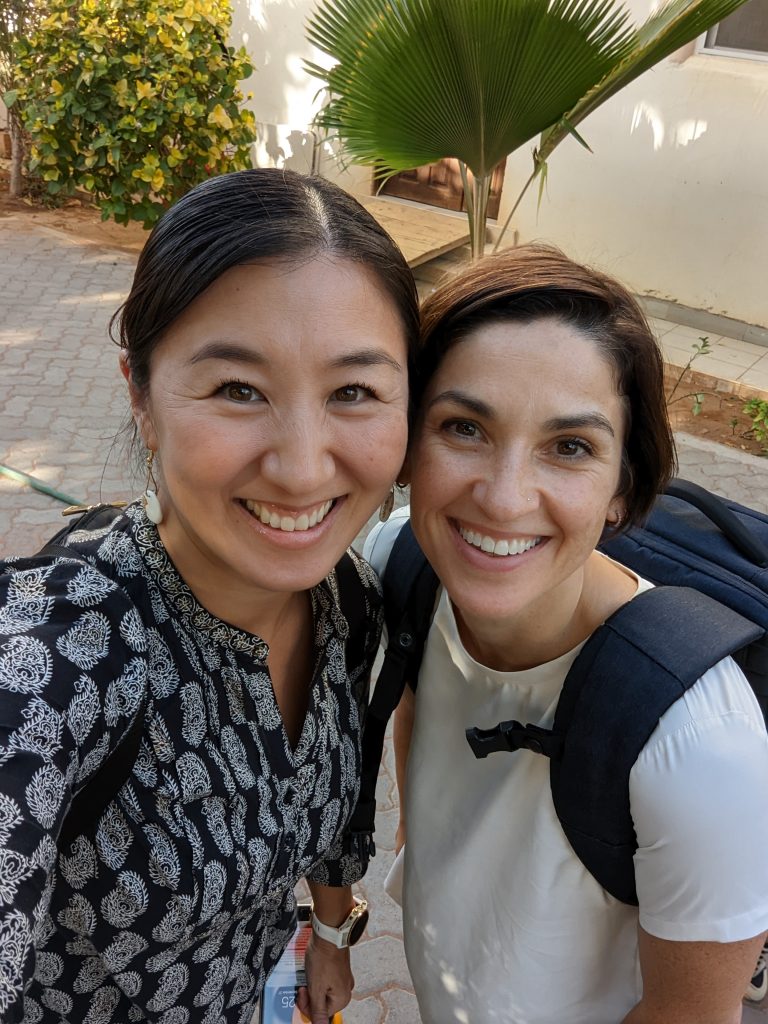 Two women smiling at the camera