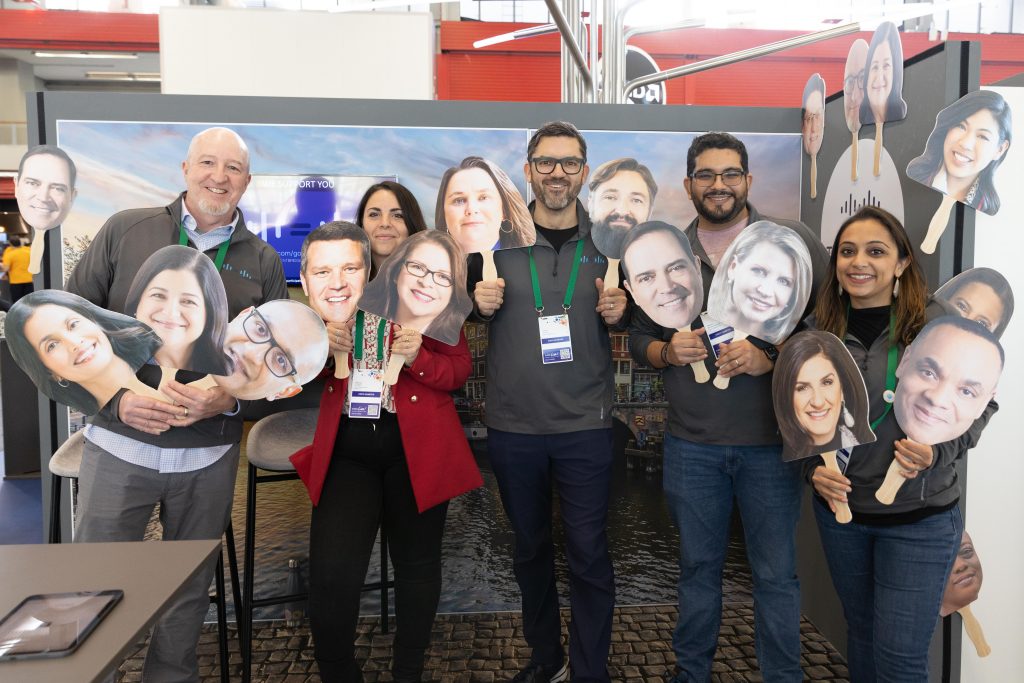 At Cisco Live! EMEA in Amsterdam, the Talent Bridge team stuck out of the crowd by offering pictures with our diverse leadership team. Attendees that stopped by could take a picture at their booth and receive a digital copy.