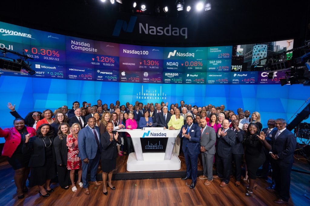 Image of a large group of people at Nasdaq ringing the opening bell for Bridge to technologies 