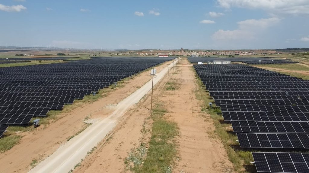 A solar farm with black solar panels.