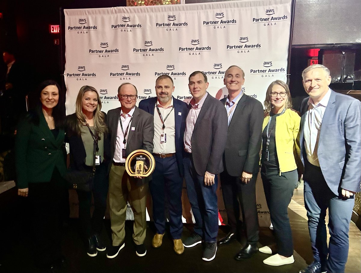 photo of a group of people accepting the ISV Partner of the year award at AWSreinvent