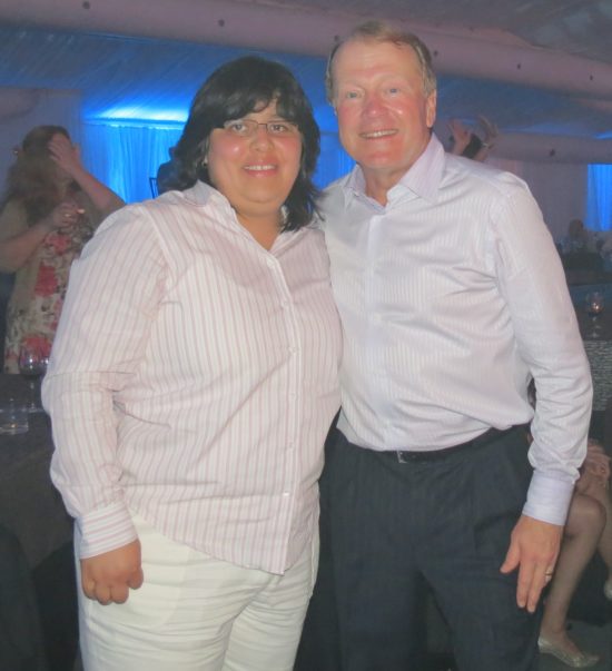 Roxana with former Cisco CEO John Chambers.