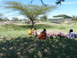 Masai women near the Sekenani Community Knowledge Center, Masai Mara. Cisco helped establish the computer learning center and Cisco Networking Academy in 2010.