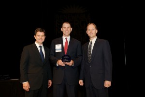 Andy Smith and Matt Kulikowski (Cisco) accepting the award from Brian Collison (EPA)