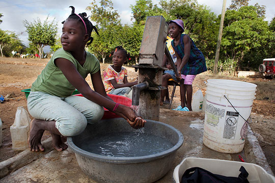 Children wash with clean water in Haiti. Courtesy Water.org