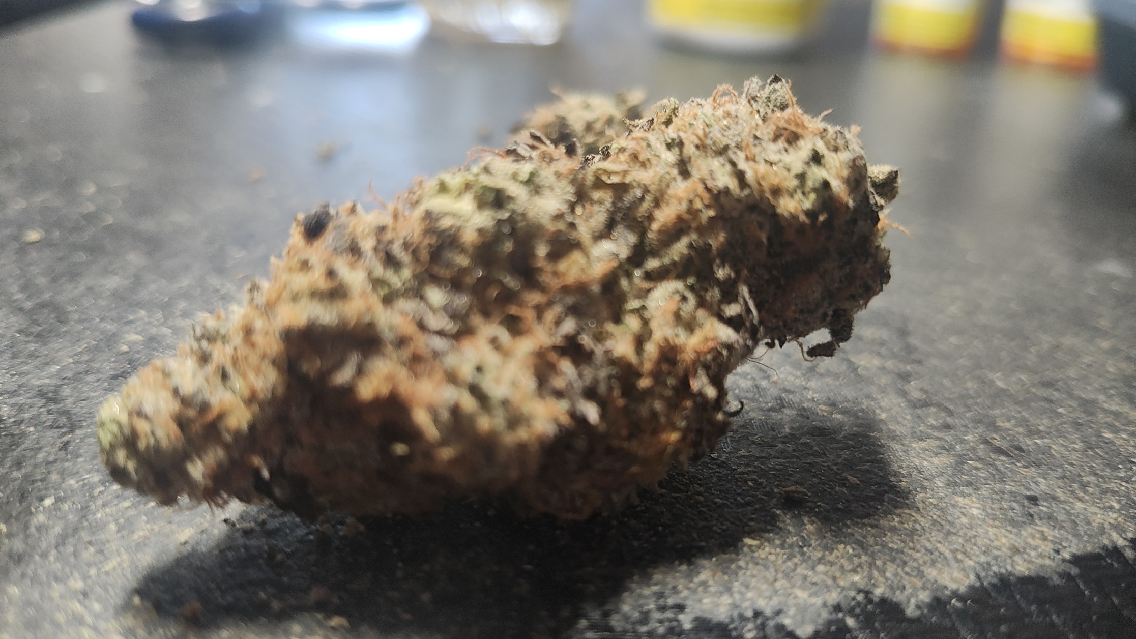 Banana Oreoz cannabis strain buds with purple trichomes and THC levels of 26 to 27 percent