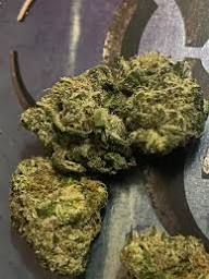 Mandarin Diesel cannabis strain buds with citrus tones and 29 percent THC in a modern urban style