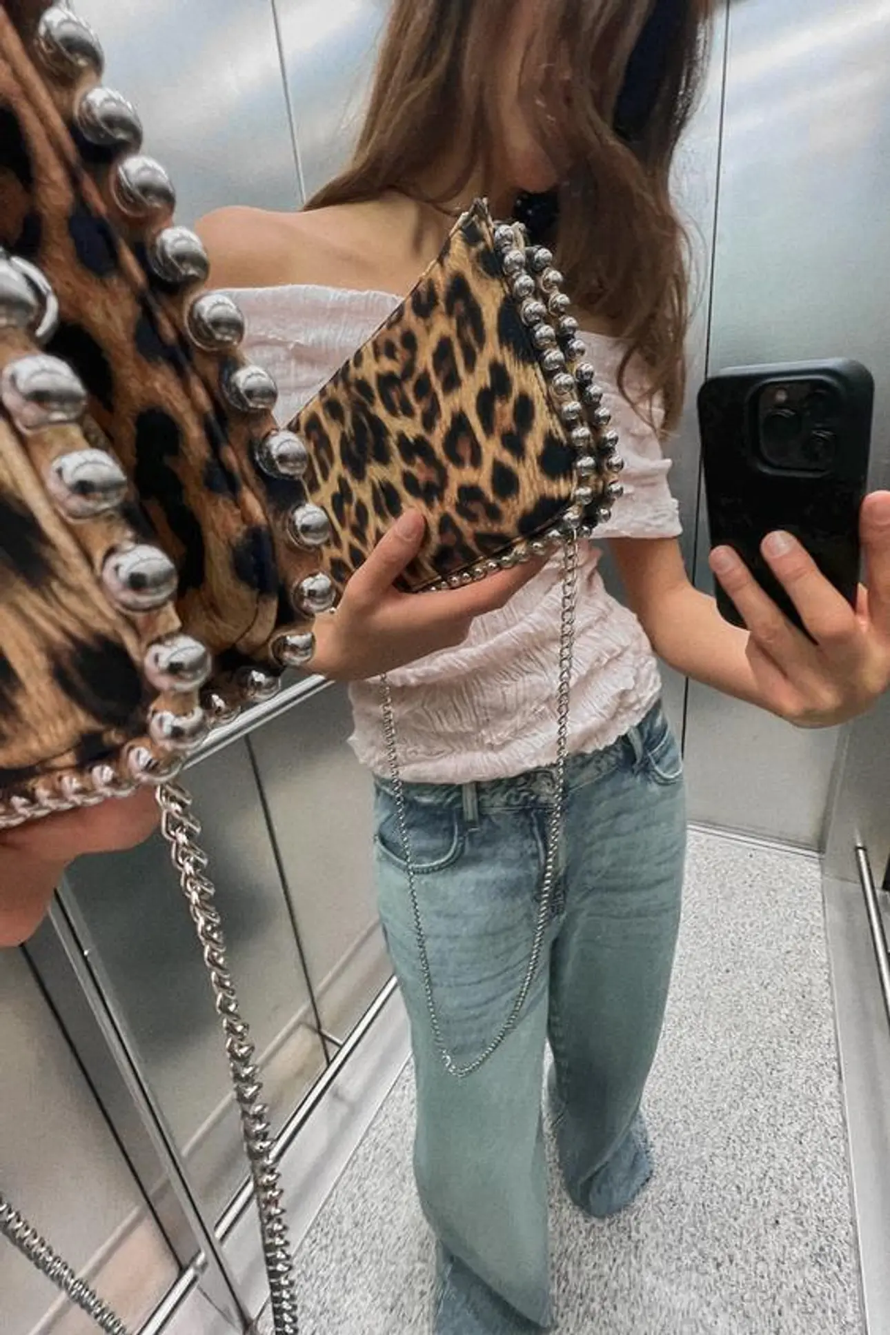 CLUTCH BAG WITH STUDS