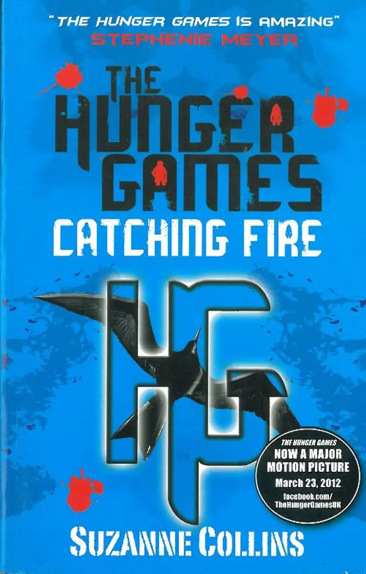 Catching Fire af Suzanne Collins