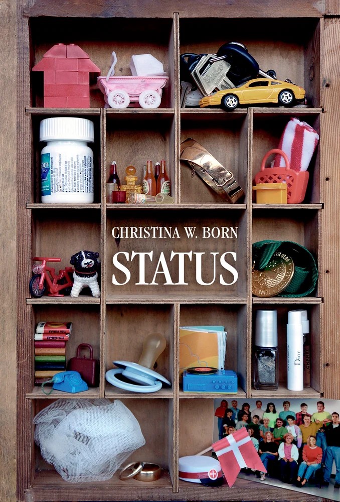 STATUS cover