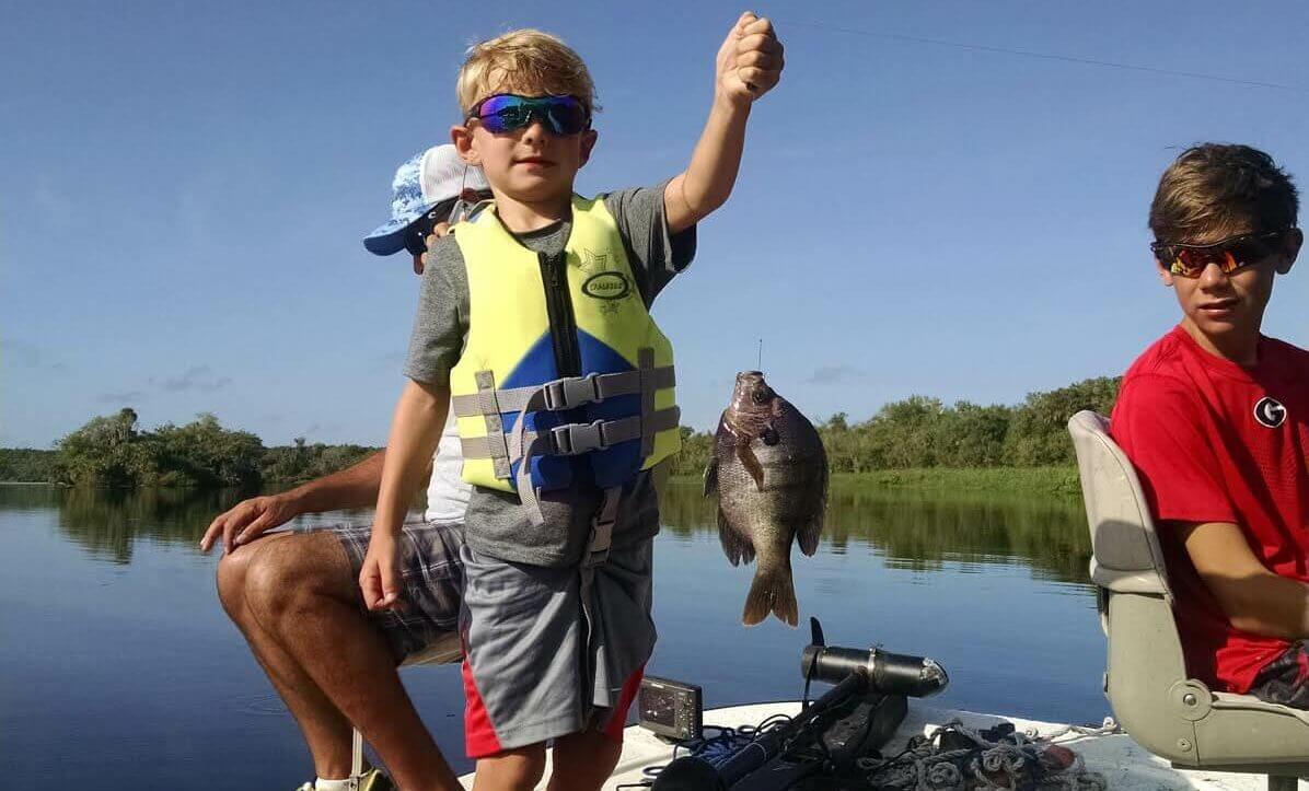 Exemplary panfish species in an angler's hand