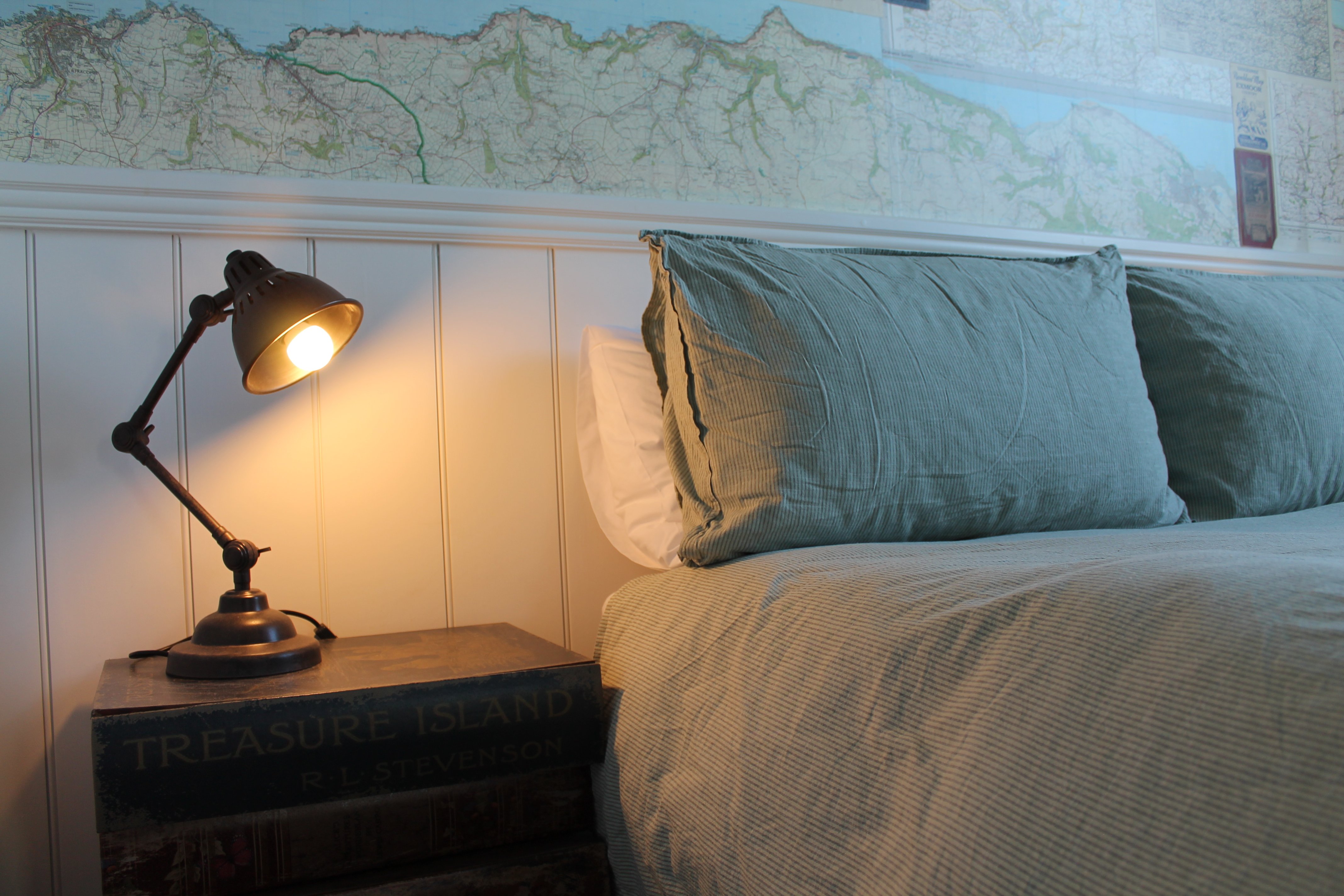 The ground floor bed and bedside table