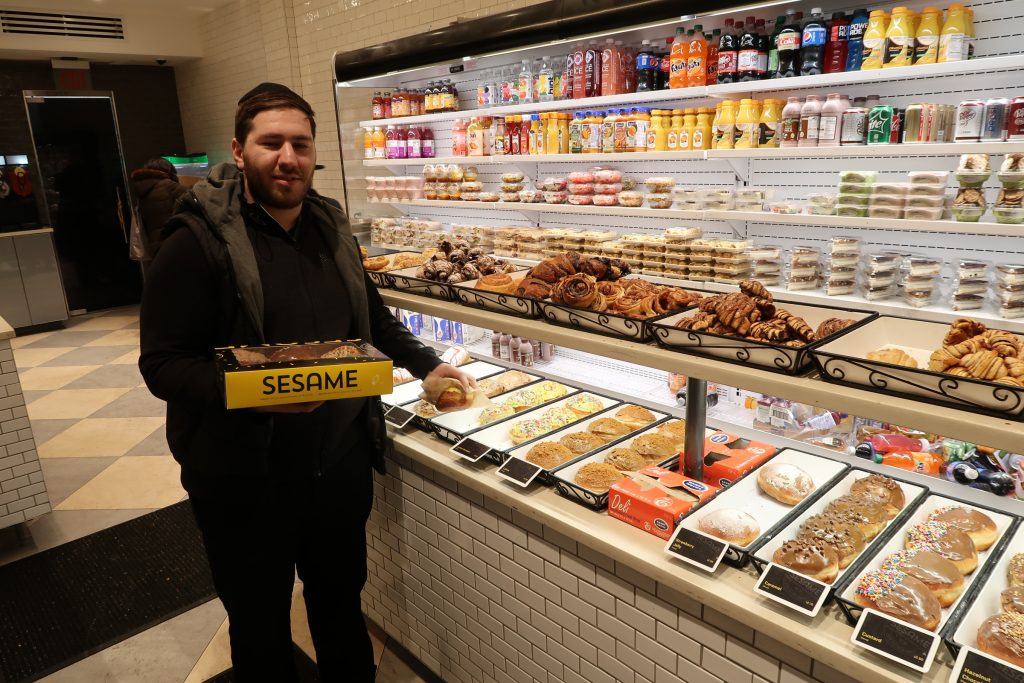 People Buying Doughnuts for Chanukah at the Famous Sesame Bakery on