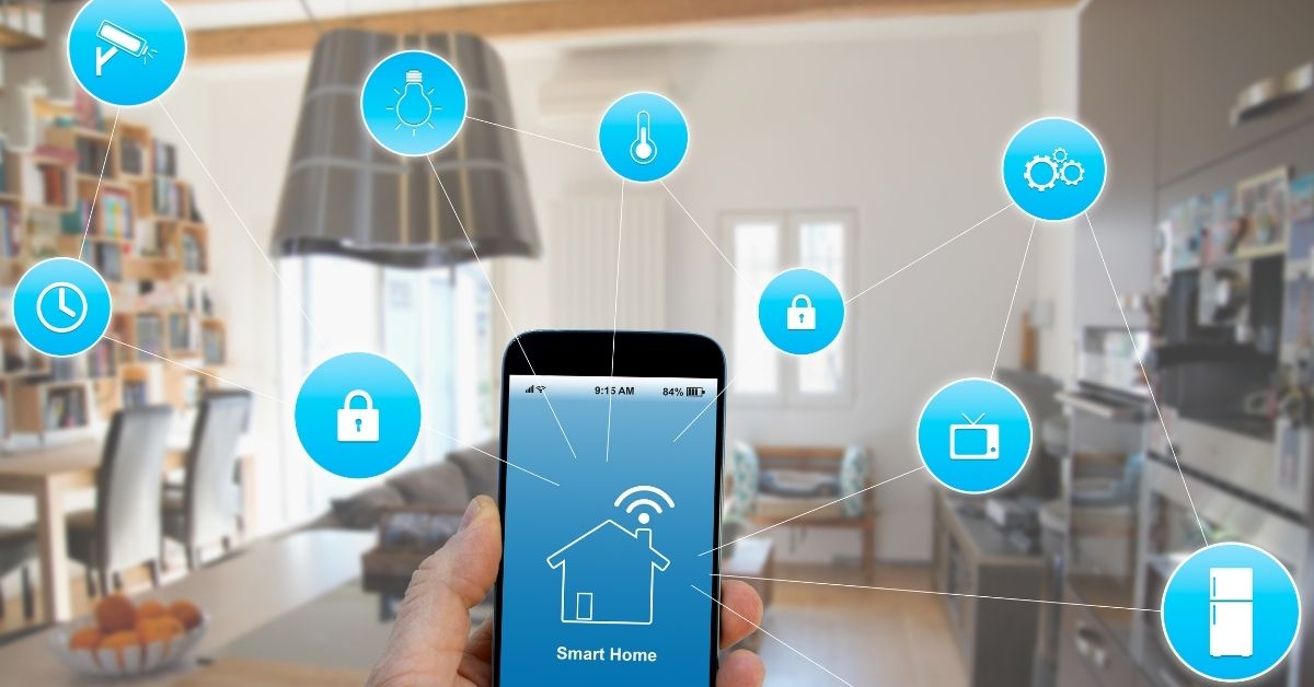 A hand holding a smart phone using smart home technology