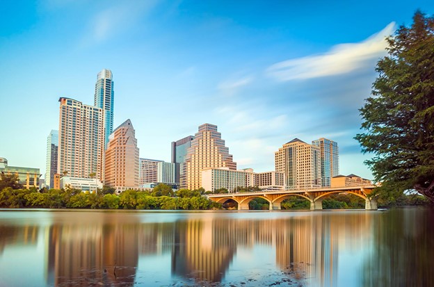 A waterfront view of the downtown skyline in Austin, TX