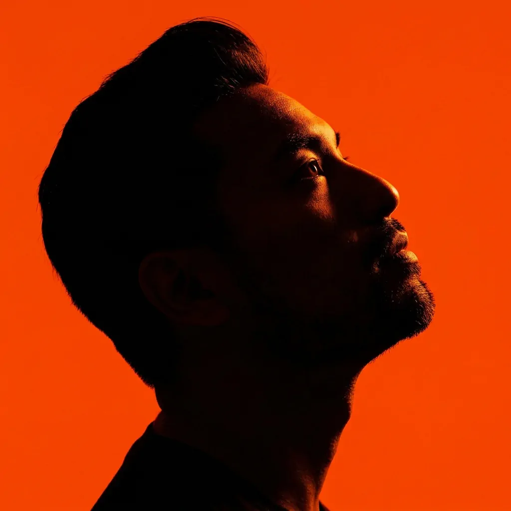 Dramatic Orange Silhouette portrait example with a man