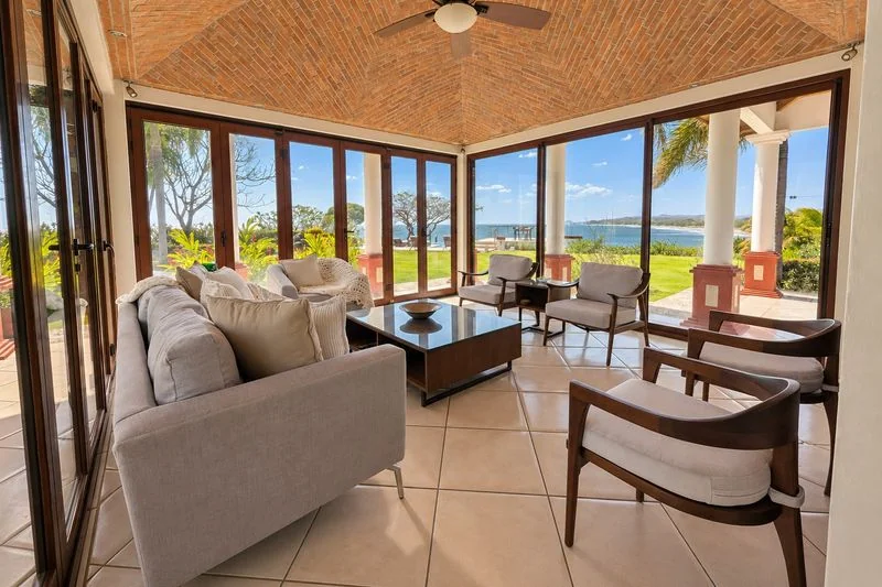 Ocean view living room with full width bifold doors