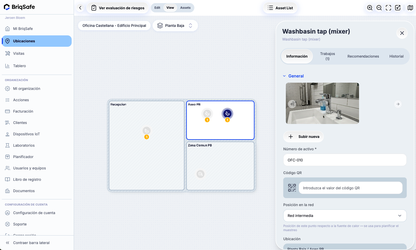 Locations screen showing asset details for a washbasin tap (mixer) including image upload, asset number, QR code entry, and network position settings.