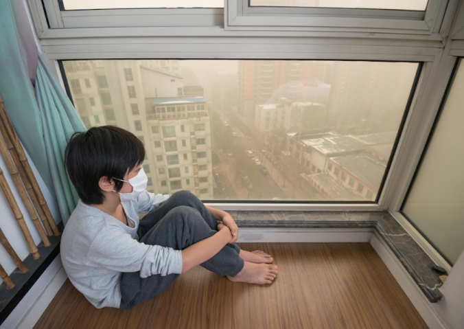 Boy in air pollution