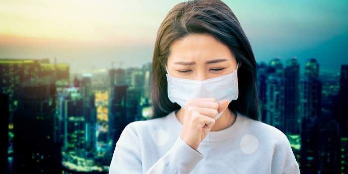Woman Wearing Mask Coughing In Air Pollution