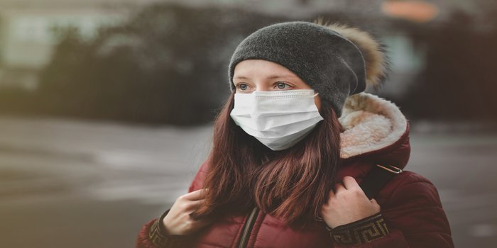 Woman Wearing A Mask In Air Pollution