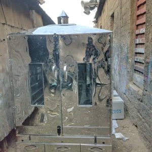 A 500 CAPACITY FISH DRYER FEATURING ELECTRIC/GAS AND CHARCOAL HEATER SYSTEMS