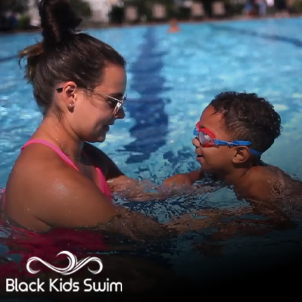 black child swimming