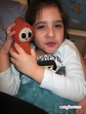 Big Sis with Orange Crochet Baby