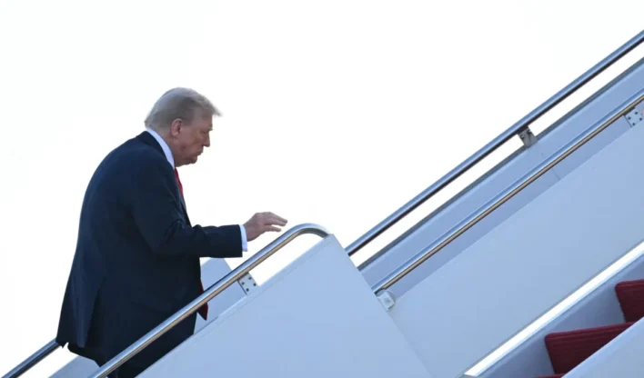 US President Donald Trump boards Air Force One at Joint Base Andrews, Maryland on August 15, 2025, as he heads to Alaska to meet with Russian President. US President Donald Trump departed Washington en route to Alaska Friday for a high-risk summit with his Russian counterpart Vladimir Putin that could prove decisive for the future of Ukraine.