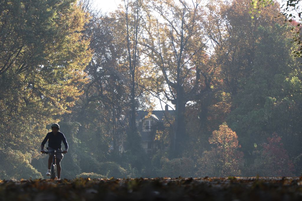 A person rides a bike during autumn season at Saddle River County Park in Bergen County, New Jersey, on Oct. 28, 2023. 