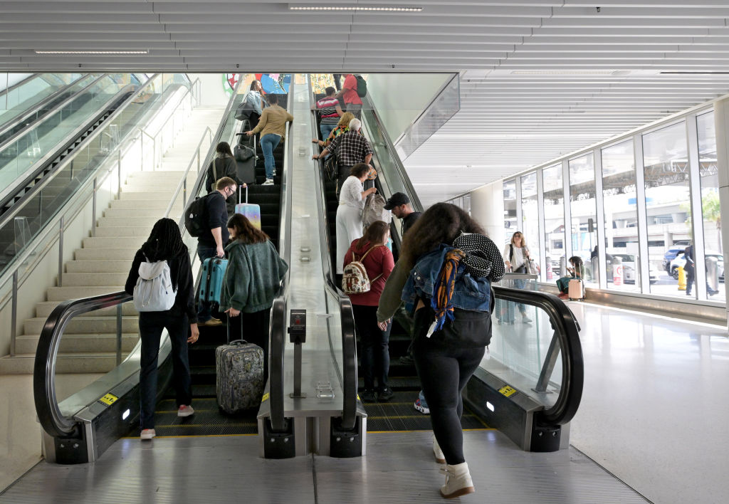 Travelers at Los Angeles International Airport the week before Thanksgiving.