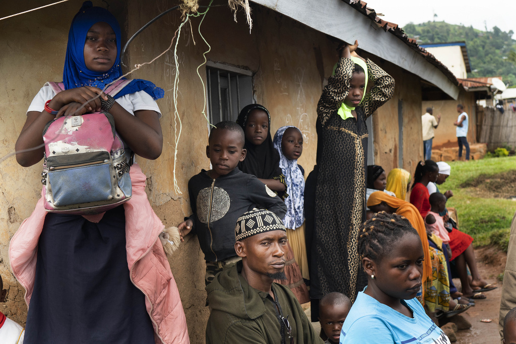 Residents wait in line to receive the Ebola vaccine in Beni, Congo DRC on July 13, 2019. 