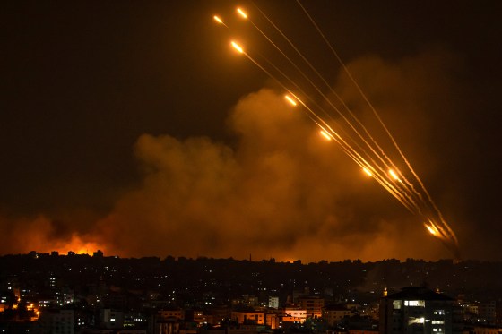 Rockets are fired toward Israel from the Gaza Strip, Oct. 8, 2023.