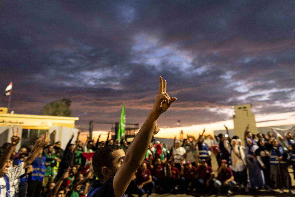 Volunteers and NGOs staff are seen at the Rafah border with Gaza on Oct. 17, 2023 in North Sinai, Egypt. 